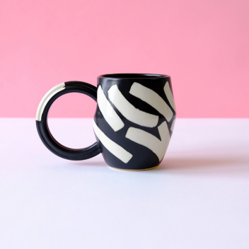 Black Mug with Eggshell Shapes